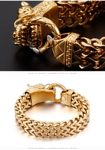 Macro shot of gold dragon head bracelet showing 316L stainless steel engraving and chain link