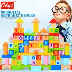 Detailed close-up of 96 wooden alphabet and number blocks stacked into a colorful toy castle