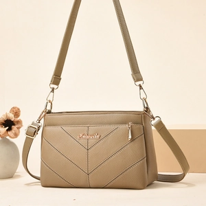 Sac bandoulière chic pour femme en similicuir kaki avec surpiqûres en V et bandoulière