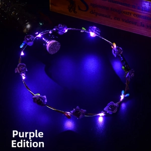 Detail view of purple LED glowing floral wreath headpiece in a dark setting