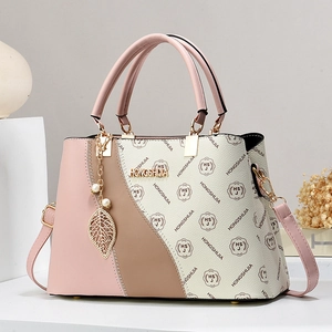 Sac à main élégant en cuir tricolore avec imprimé floral vintage et pendentif feuille dorée