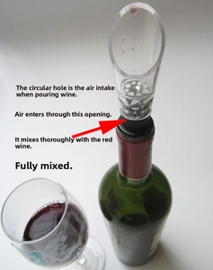 Detail showing the rapid wine aerator pourer mounted on a bottle with an air intake vent