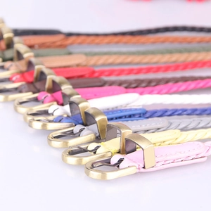 Multiple colors of handcrafted braided leather belts with metal pin buckles for women