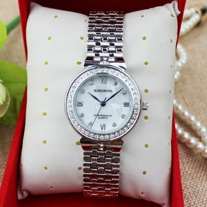 Silver luxury women's diamond watch with mother-of-pearl dial on a red gift box