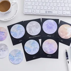 Creative planet series round sticky notes with detailed celestial patterns on desktop