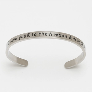 Silver open cuff bracelet engraved with I love you to the moon and back text