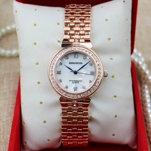 Elegant rose gold rhinestone watch with mother-of-pearl dial and solid metal strap