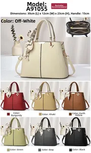 Detailed view of structured leather handbag size 30x12x23cm showing seven colors