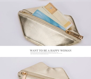 Close-up of golden lip-shaped PU leather coin purse with metallic texture and zipper