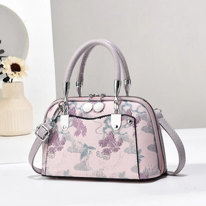 Elegante hellrosa Handtasche mit floralem Muster im chinesischen Stil und Silber-Details