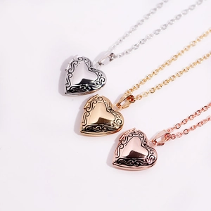 Locket necklace in gold, silver, and rose gold with vintage engraved heart photo pendant