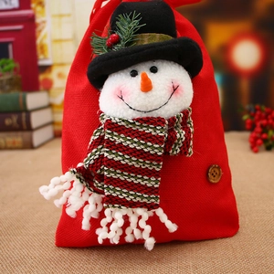 Christmas Santa gift bag in red burlap with a 3D snowman doll and wooden button