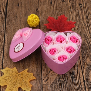 Pink heart-shaped tin box featuring six soap rose flowers and a sweet love ribbon bow