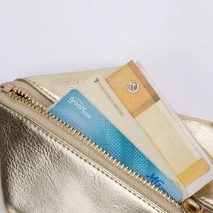 Golden faux leather coin purse with metallic texture and card slots storage
