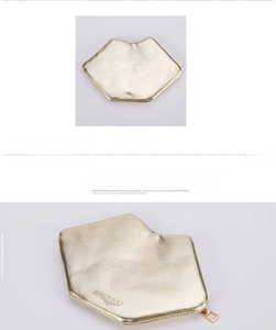 Detail of creative lip-shaped coin purse in metallic gold PU leather with zipper closure