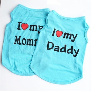 Detail view of two sky blue dog t-shirts with I Love My Mommy and Daddy prints