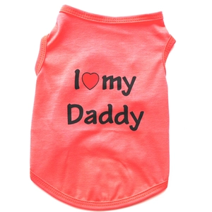 Detail of orange pet vest with black I Love my Daddy print and neat hem stitching