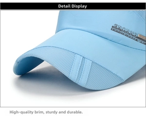 Detail view of light blue sports cap with breathable mesh and reinforced brim stitching