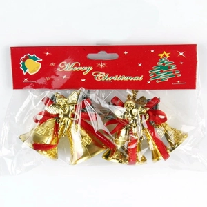 Golden Christmas bell decoration with angel figure and red ribbon detail in clear packaging