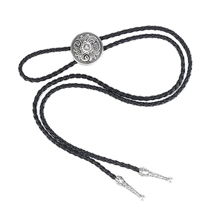 Celtic pattern bolo tie with black braided leather rope and embossed silver buckle