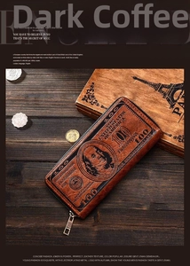 Detail of vintage $100 bill pattern on long brown leather wallet with metal zipper