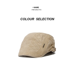Detail van de beige denim baret met gewatteerde zijkanten en verstelbare metalen gesp