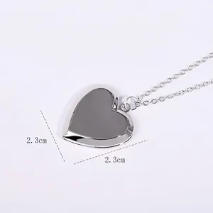 Polished silver heart-shaped floating locket necklace with opening charm design