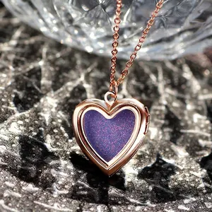Rose gold heart locket necklace with purple glitter enamel and shimmering chain