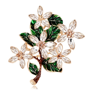 Vintage floral enamel brooch with gold stem green leaves and champagne crystal flowers