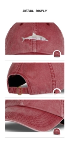 Close-up of vintage washed shark embroidery and adjustable metal buckle on cotton baseball cap