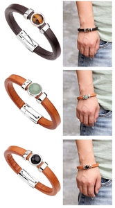 Three men's leather bracelets with metal magnetic clasps and tiger eye, jade, or obsidian stones