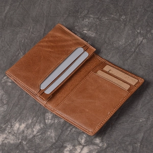 Detailed view of the brown vintage leather wallet interior with multiple card slots