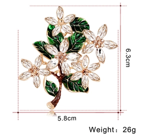 Detail view of flower brooch showing 6.3cm height and 5.8cm width dimensions