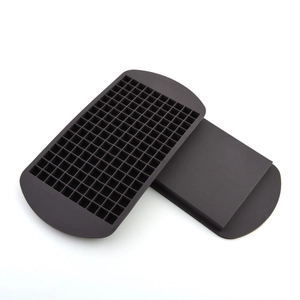 Detail of a black food-grade silicone square ice cube tray set with grid pattern design