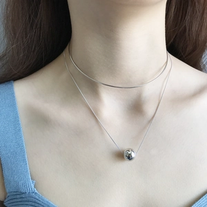 Detail of S925 sterling silver double layer choker with polished 12mm bead pendant