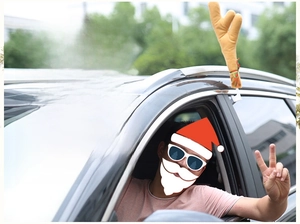 Detailed view of plush reindeer antlers with sturdy buckles installed on a car window