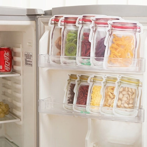 Mason jar shaped reusable storage bags for food snacks in a refrigerator side shelf