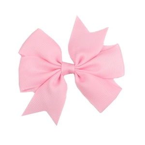 Pink grosgrain ribbon bow hair clip for babies with textured ribbed fabric detail