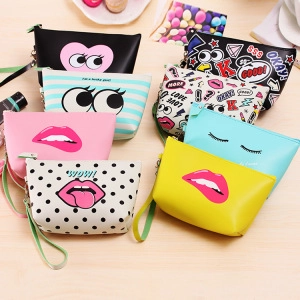 Macro shot of assorted cartoon printed tinplate pouches on a rustic wooden background