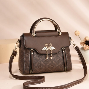 Brown monogram PU leather handbag with swan heart buckle and pearl chain detail
