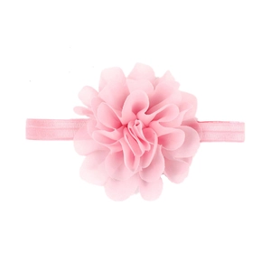 Close-up of a pink chiffon flower on an elastic headband for baby girls