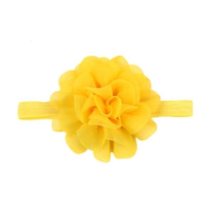 Detail of yellow handmade chiffon flower on elastic baby headband with textured petals