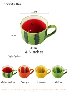 Detail view of 400ml hand-painted fruit ceramic mugs with watermelon and citrus designs