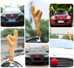 Detail of Christmas reindeer car kit with brown plush antlers and red nose decorations