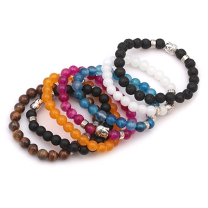 Close-up of 8mm beaded bracelets with tiger eye, lava stone and silver Buddha heads