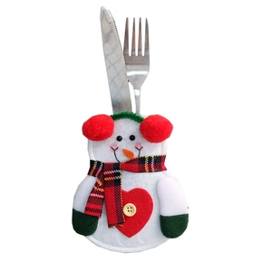 Detailed view of snowman cutlery holder with heart buttons and plaid felt fabric