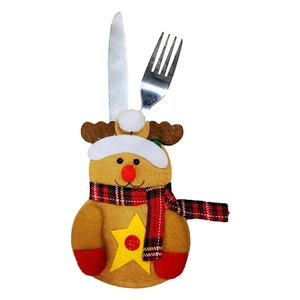 Detail of reindeer-shaped felt cutlery holder with red plaid scarf on white background