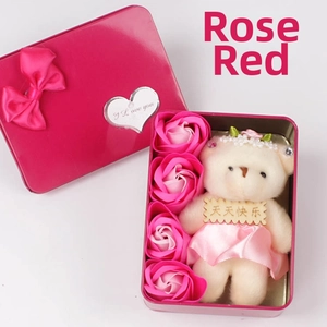 Detail of rose red heart-shaped tin box with soap roses and cute plush bear gift set