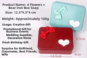 Detail of soap flower gift boxes with silk bows and heart I Love You stickers