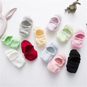 Pack of ten colorful breathable cotton no-show socks for kids with anti-slip silicone